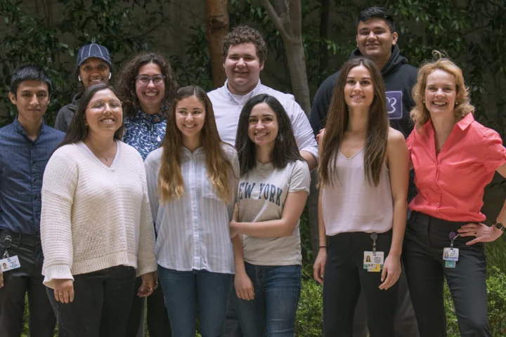 Jonathan Lopez, Hana Abdirahman, Victoria Parrilli, Andrew Kamali, Kunal Ranat, Salma Arredondo, Rochelle Bitolas, Linda Tajalli, Izzy Bonacorsi and Ina Wanner in front of the Gordon Neuroscience Research Building at the UCLA medical campus in 2019.